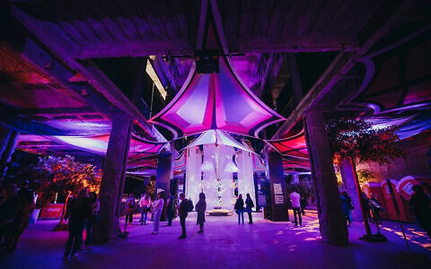 Visitors walk through the Nova Exhibition in Los Angeles, where immersive installations recreate the site of the 7 October massacre. Photo: Nova Exhibition