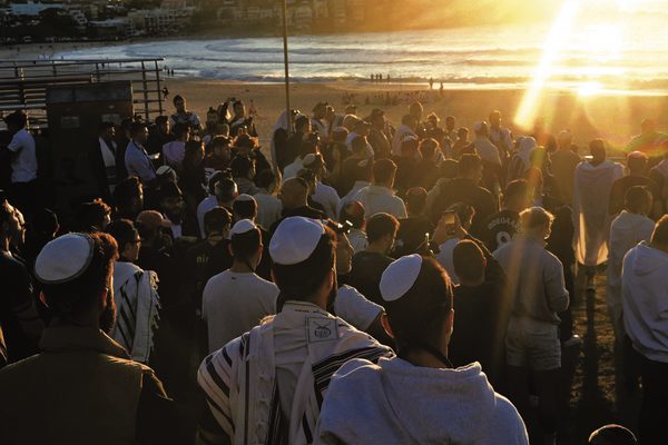 People gather at sunrise on Bondi Beach to pray in support of Israel and the hostages who were kidnapped by Hamas. Photo: Jeremy Piper/State Library of NSW People gather at sunrise on Bondi Beach to pray in support of Israel and the hostages who were kidnapped by Hamas. Photo: Jeremy Piper/State Library of NSW