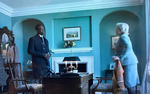 Frances Munning, played by Penny Downie in The Diplomat, in a tribute scene to the late Hersh Goldberg-Polin in season four, tells an anecdote to Stuart Heyford, played by Ato Essandoh Photo: Screenshot