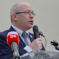Israeli Ambassador Hillel Newman addresses the commemoration.