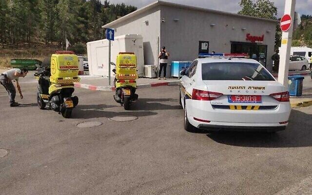 First responders at the scene of a shooting attack at a gas station near the West Bank settlement of Eli on June 20, 2023. (Magen David Adom)