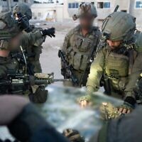 جنود من اللواء 401 مدرع يعملون في شرق رفح في جنوب قطاع غزة، في صورة تم نشرها في 13 مايو، 2024.  (Israel Defense Forces)