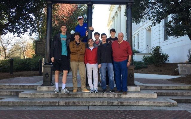 Model U.N. team members Aaron Gordon, Justin Wolozin, Yarden Willis, Asher Stadler, Adam Spector, Jordan Arbiv and Sam Fialkow hang out at UGA with faculty adviser Marc Leventhal. Not pictured is team member Shannan Berzack. 
