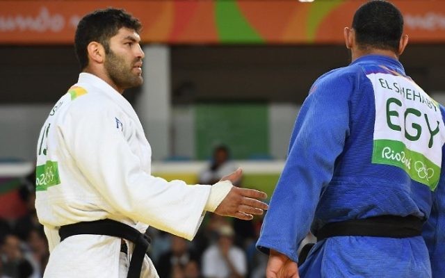 Egyptian Islam El-Shahaby refuses to shake hands with Israeli Judoka Or Sasson after being defeated in the first round of the heavyweight judo competition at the Rio Olympics in 2016.