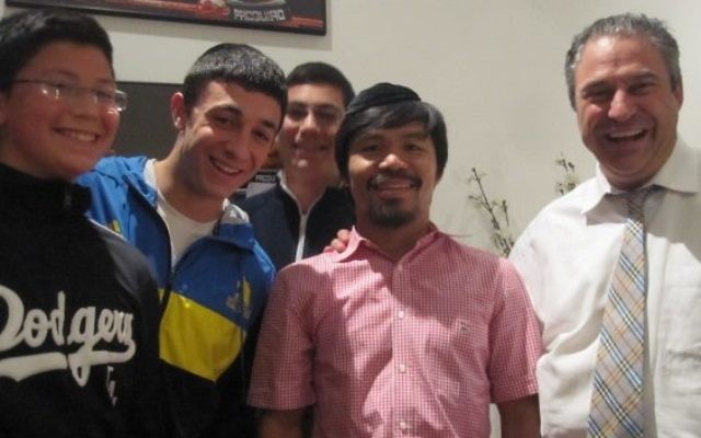 Antony Gordon and his sons hang out with client Manny Pacquiao.