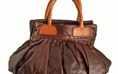 Arteeni.com sells items from 113 artists and designers, including a leather handbag from Havenstreet Studios.