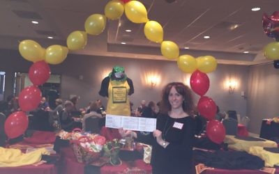 Shauna Horvath displays her “game on” mah jongg card at the Breman Jewish Home benefit at Temple Sinai on Jan. 30.