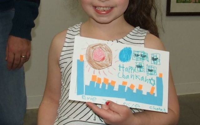 For Evie Carmel, a runner-up in the 6-and-under category, Chanukah is too festive for only nine candles.