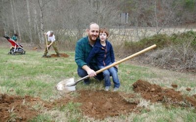 During a Tu B'Shevat retreat at Ramah Darom in 2017, participants help plant a fruit orchard.