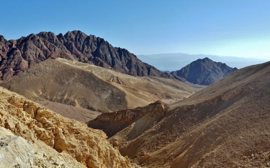 Could the black mountain to the right, west of Eilat, be the biblical Mount Sinai?