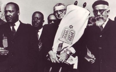 (From left) Martin Luther King Jr., Rabbi Maurice Eisendrath and Rabbi Abraham Joshua Heschel march in Montgomery, Ala.