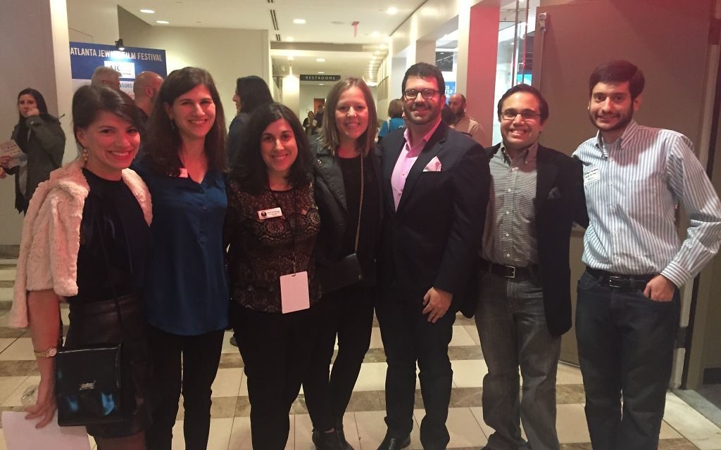 Enjoying young professionals night at the film festival are (from left) event co-chair Maddie Cook, Julia Katz, Dina Fuchs-Beresin, Gabby Leon, event co-chair Mark Spatt, Brandon Goldberg and ACCESS co-chair Nathaniel Goldman.