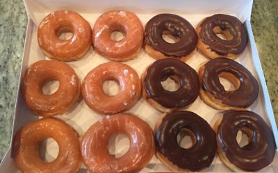 One box of the four dozen doughnuts sacrificed to Super Bowl science awaits the lab work.