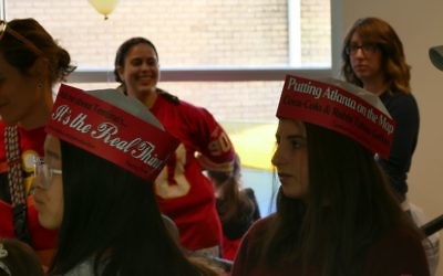 Temima students promote the forthcoming musical during the Purim carnival at Congregation Beth Jacob on Sunday March 5