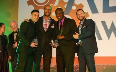 (From left) Jason Kagan, Edrick Ramsay, Byron a Cooper and Aaron Payes celebrate Kagan Entertainment’s double win at the Allie Awards.