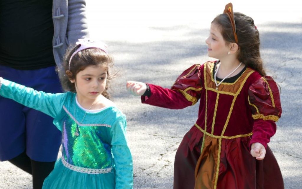 Costumed Esthers put girl power on display each Purim.