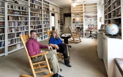 Philip and Elise Goldstein enjoy their Judaica and Southern books while rocking in the library.