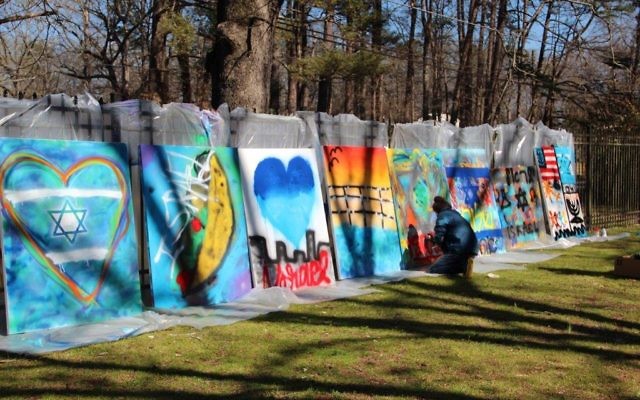 Photo courtesy of the Marcus JCC
Teens portray their love of Israel through graffiti art March 19. The resulting eight 4-by-5-foot murals will be on display at the Katz Family Main Street Gallery from April 30 to May 31.