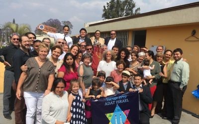 Adat Israel in Guatemala City welcomes its new Torah, a gift from the defunct Congregation Anshe Emeth in Arkansas.