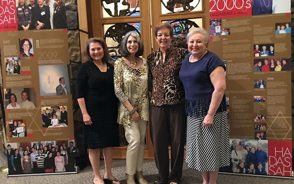 (From left) Hadassah Greater Atlanta President Sheila Dalmat joins Chesed co-chairs Phyllis M. Cohen, Eileen Cohn and Linda Weinroth amid signs of Hadassah’s Atlanta history.