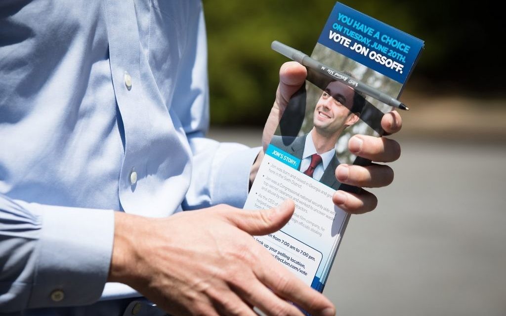Jon Ossoff goes door to door in Sandy Springs on May 11. (Photo by Dustin Chambers, Ossoff campaign)
