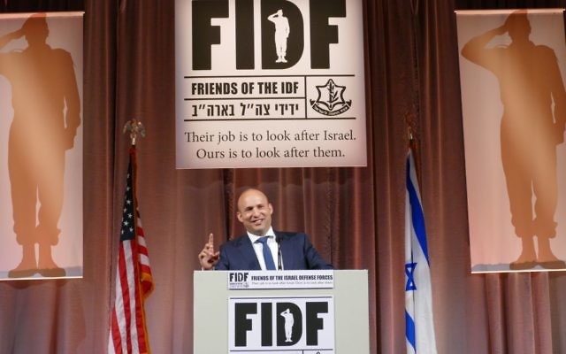 Education and Diaspora Affairs Minister Naftali Bennett speaks at the FIDF gala May 8.