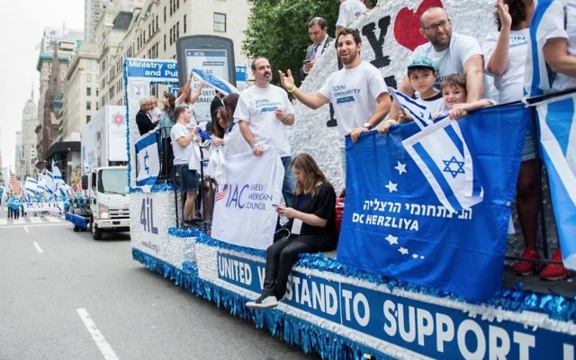 Photos by Alexi Rosenfeld
Israel supporters turn New York’s Fifth Avenue blue and white Sunday, June 4.