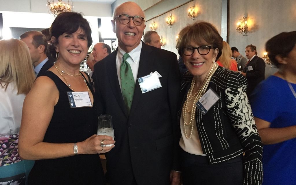 Cindy Paradies (left) talks with last year’s Selig Award honorees, Tom and Spring Asher.