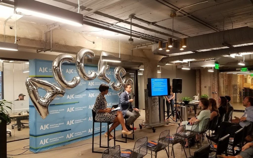 Jamestown CEO Matt Bronfman and event moderator Leah Fleming chat at American Jewish Committee’s ACCESS in the ATL June 22 hosted at Industrious inside of Ponce City Market.