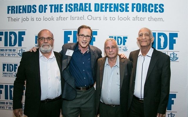 Joel Alpert poses with the iconic paratroopers of the Six-Day War: (from left) Zion “Zigi” Karasanti, Yitzhak Yifat and Haim Oshri.