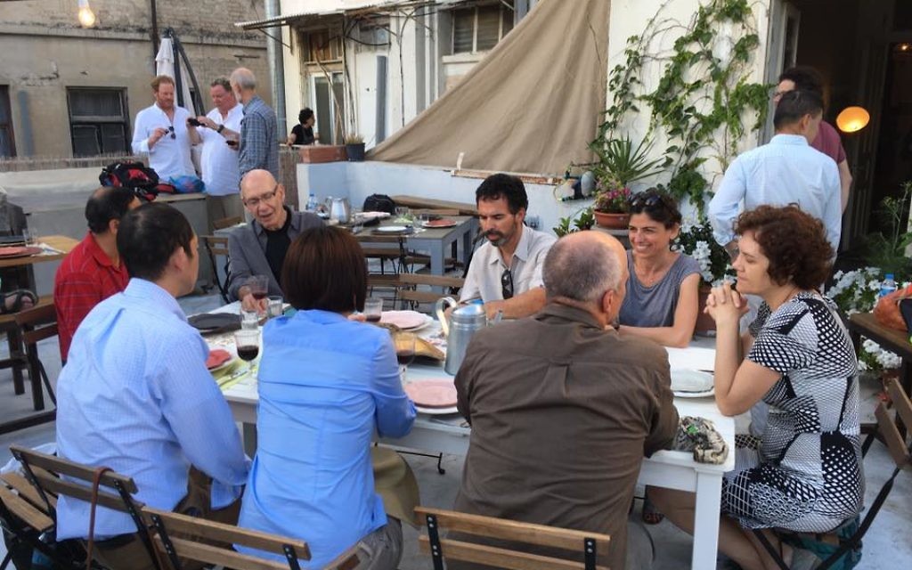Some of the 26 fellows enjoy the social side of Israel.