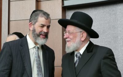 Rabbis Ilan Feldman and Israel Meir Rau share a few moments after the dedication ceremony.