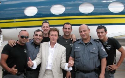 Photo by Yuval Erel
Paul McCartney poses with Israeli police before his performance in 2008.