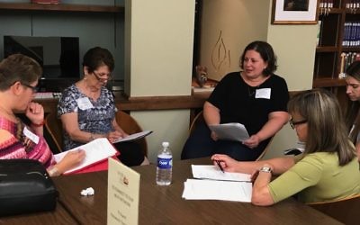 Educators at the Atlanta Jewish Education Directors Council’s annual professional development kallah at Temple Sinai on Aug. 13 participate in “Teaching Jewish Texts Through Music,” a session led by Eli Sperling of the Center for Israel Education.
