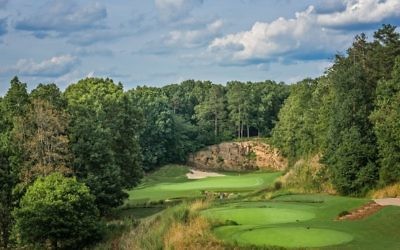 The par-3 17th at the Standard Club is the signature hole of the course, which was fully redesigned in 2005 by golf course architect Mike Riley.
