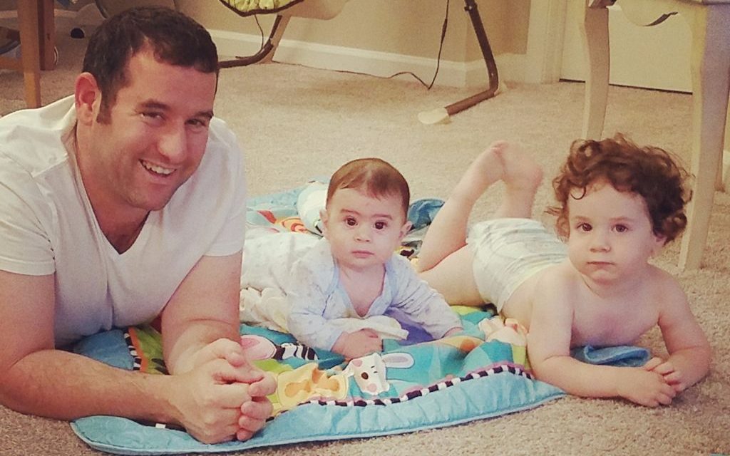 Shaked Angel, shown with his young children, has been in Atlanta since July.