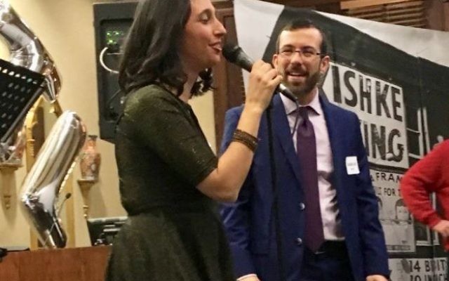 Emily Kaiman surprises her husband, Rabbi Ari Kaiman and brings down the house at the party with a rendition of Elton John’s “Your Song,” which her husband played for her in an airport when they were dating.