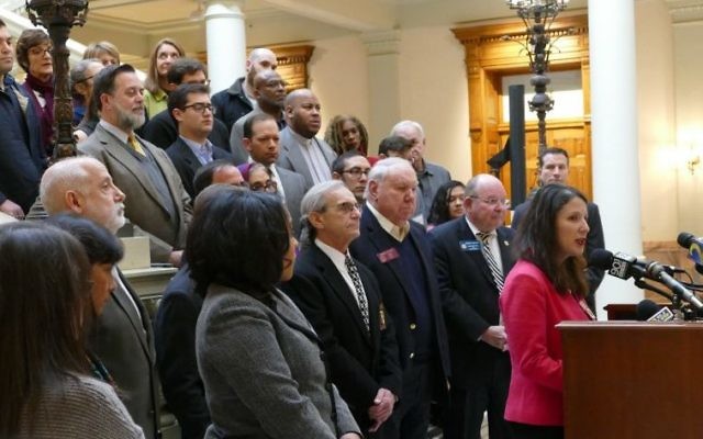 Backed by lawmakers, law enforcement officials and representative of the Coalition for a Hate-Free Georgia, ADL Southeast Regional Director Allison Padilla-Goodman explains the need for hate-crimes legislation Jan. 3 at the Capitol.