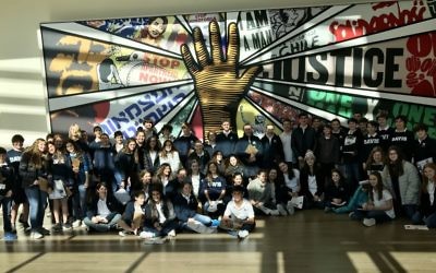 Seventh-graders from the Davis Academy explore the National Center for Civil and Human Rights during an educational excursion.