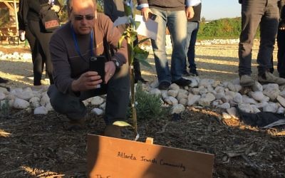 The Jewish leadership mission planted fruit trees on Tu B'Shevat.