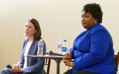 Former Reps. Stacey Evans (left) and Stacey Abrams listen to a question from the audience at the Jewish Democratic Women's Salon forum Thursday, Feb. 22, in Sandy Springs.