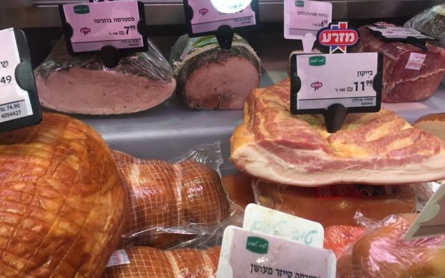Pork products from Kibbutz Mizra are sold in an Israeli grocery store. (Photo courtesy of Southern Foodways)