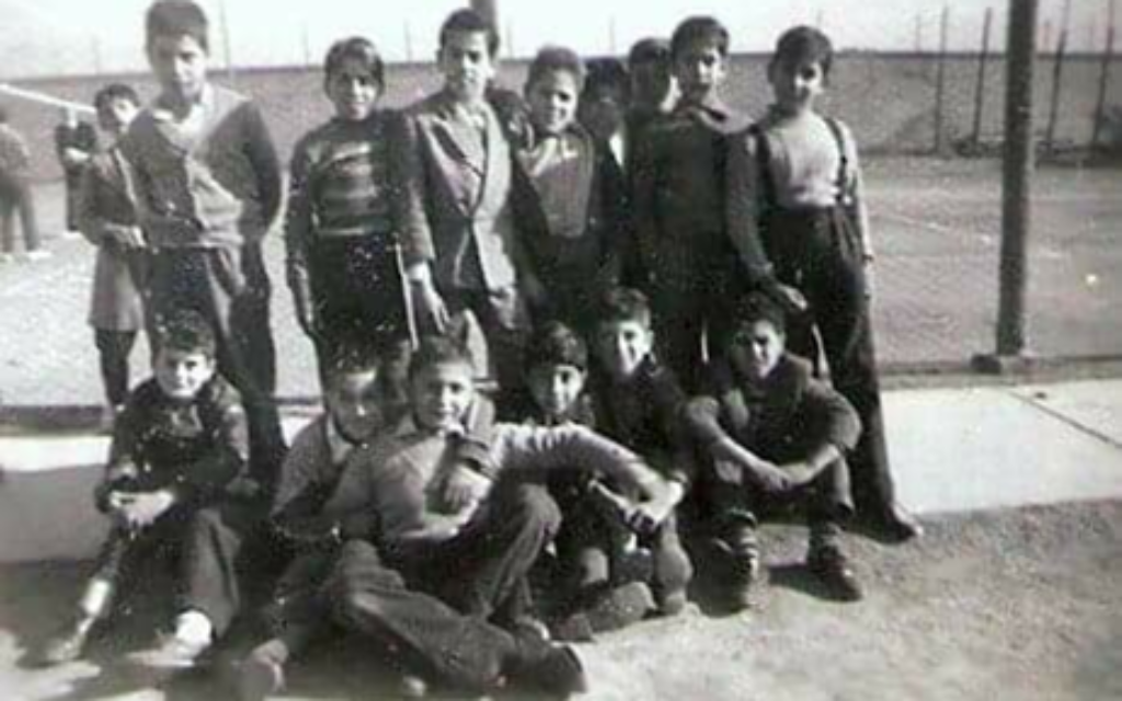 Maurice Shohet (far right in suspenders) experiences everyday life as a boy in Iraq in the 1950s.