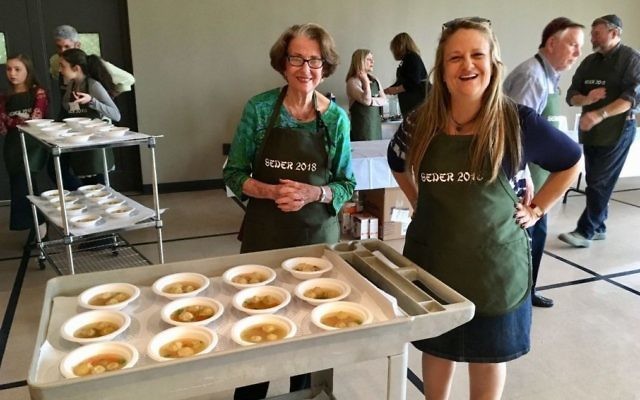 Judy Tager and Shearith Israel Executive Director Jodi Salomon are ready to serve matzah ball soup.