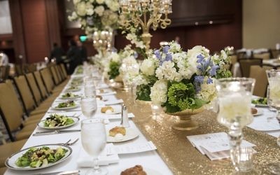 Alyson Pollack arranged each table with intricate details for the wedding reception at the Omni at CNN Center.