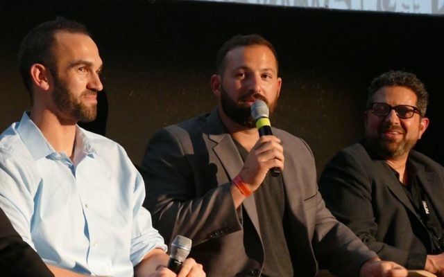 Cody Decker, who insists that his favorite baseball film is the Tom Selleck classic “Mr. Baseball,” answers a question after the second of three screenings of “Heading Home” at the Atlanta Jewish Film Festival in February. To his right is teammate Josh Zeid; to his left is filmmaker Seth Kramer.