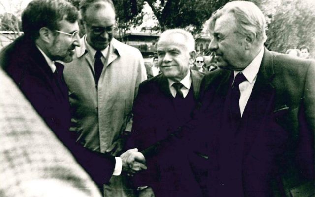 Temple Rabbi Alvin Sugarman (left), accompanied by U.S. Ambassador Thomas Pickering, is welcomed to Jerusalem by Mayor Teddy Kollek (right) and Prime Minister Yitzhak Shamir for a Martin Luther King Day address in January 1986.