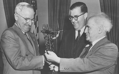 Prime Minister David Ben-Gurion and Ambassador Abba Eban present a menorah to President Harry Truman in 1951. (Photo by Fritz Cohen, Israeli Government Press Office)