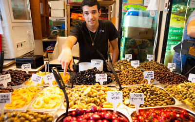 Outdoor markets such as Carmel in Tel Aviv attract tourists with a myriad of foods and spices.