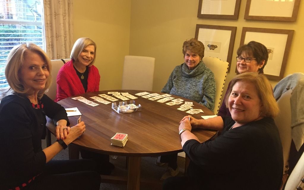 Audrey Mande, Arlyne Delman, Iris Wynne, Susan Kaye and Debbie Miller enjoy the challenge and the socializing that canasta provides.